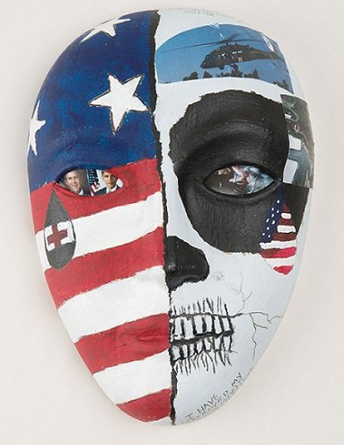 “An Army flight medic.” The mask represents our country shedding tears for our military on one side, and our military shedding tears for our country on the other side. Quotes on the military side, which also symbolizes death via the skull, read: “Shed no more tears, your medic will shed them for you,” and “I have destroyed my life and myself so that others may live.” This mask is by a military service member from art therapy sessions at the National Intrepid Center of Excellence, Walter Reed National Military Medical Center. (National Museum of Health and Medicine photo by Matthew Breitbart)