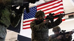 U.S. Army Sgt. Caleb Flynn, a medic assigned to Army Health Clinic - Vicenza, fires an M4 carbine during a weapon familiarization training