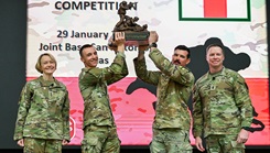 Lt. Gen. Mary K. Izaguirre, Army surgeon general and commander of U.S. Army Medical Command and Command Sgt. Maj. John E. Dobbins, command sergeant major of U.S. Army Medical Command, present the winners of the 2026 Best Medic Competition. (U.S. Army photo)