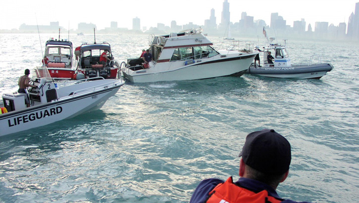 Image of Military personnel conducting boating safety patrols.