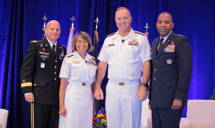 (From left to right): Army Brig. Gen. Ronald Stephens, deputy chief of staff for support, U.S. Army Medical Command; Navy Vice Adm. Raquel Bono, director Defense Health Agency; Navy Rear Adm. Terry Moulton, deputy Surgeon General, deputy chief, Navy Bureau of Medicine and Surgery; and Air Force Maj. Gen. Roosevelt Allen, director, Medical Operations and Research, and chief of the Dental Corps, Office of the Air Force Surgeon General.