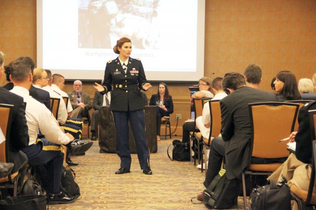 U.S. Army Medical Materiel Agency Commander Col. Lynn Marm addresses the crowd during a panel session at the Military Health System Research Symposium Aug. 29 in Kissimee, Florida. The panel session focused on challenges in getting medical products to the field. (Photo Credit: Greg Pugh, USAMMA Visual Information)