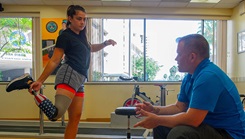 U.S. Marine LCpl. Annika Hutsler works with James Malinak, a prosthetician at Naval Medical Center San Diego’s Comprehensive Combat and Complex Casualty Care clinic to adjust her prosthetic leg. C5 serves to deliver multidisciplinary, quality health services in an outpatient rehabilitation facility for wounded, ill, and injured service members. (Photo: U.S. Navy Mass Communication Specialist 3rd Class Jake Greenberg)