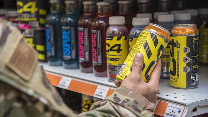 A service member checks the label on a supplement. Service members must remain diligent and check labels on consumer products and follow official guidance on CBD products. (U.S. Air Force photo by Staff Sgt. Nicole Leidholm)