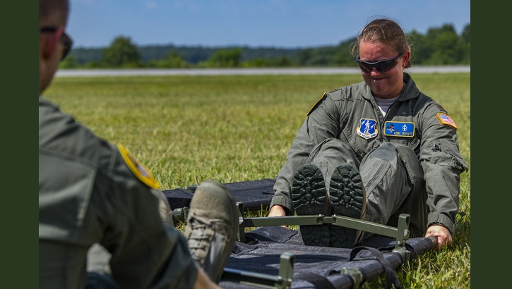 Air Force Maj. Lori Wyatt, a Critical Care Air Transport Team nurse, assigned to the 167th Airlift Wing, Martinsburg, West Virginia, assembles a gurney during a casualty evacuation training at the Raleigh County Memorial Airport. The Air Force is increasing the number of CCATTs to support future readiness requirements. (U.S. Air Force photo by Master Sgt. De-Juan Haley)