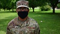 Military personnel wearing a face mask