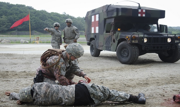 The medics of the 1st Battalion, 9th Cavalry Regiment, 2nd Armored Brigade Combat Team, 1st Cavalry Division, respond to a casualty evacuation during a training exercise at Rodriguez Range, South Korea.