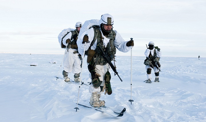 Paratroopers with U.S. Army Alaska’s 4th Infantry Brigade Combat Team (Airborne), 25th Infantry Division ski across the drop zone during Exercise Spartan Pegasus in Deadhorse, Alaska.