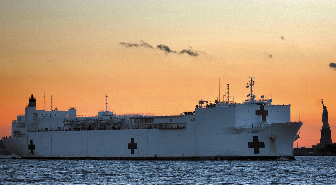 Image of Military Sealift Command hospital ship USNS Comfort steams into New York City Sept. 14, 2001, in the wake of the 9/11 attacks. (U.S. Navy photo by Petty Officer 1st Class Preston Keres).