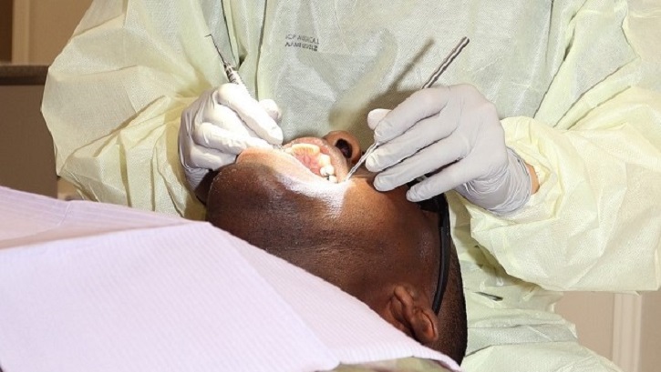 Image of patient getting a dental exam.