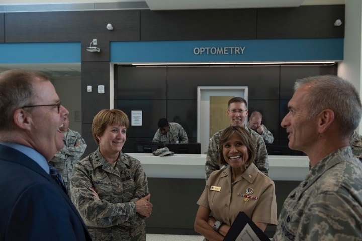 Leaders of the Defense Health Agency and the U.S. Air Force Surgeon General discuss changes made to the 4th Medical Groupâ€™s new facility, Sept. 6, 2018, at Seymour Johnson Air Force Base, North Carolina. Military medicine is changing to a single, integrated health system designed around patients and ensuring military medical readiness beginning in Oct. 1, 2018. Over time, the integration and standardization of healthcare will provide patients with a consistent, high-quality health care experience, no matter where they are. (U.S. Air Force photo by Airman 1st Class Jacob B. Derry)