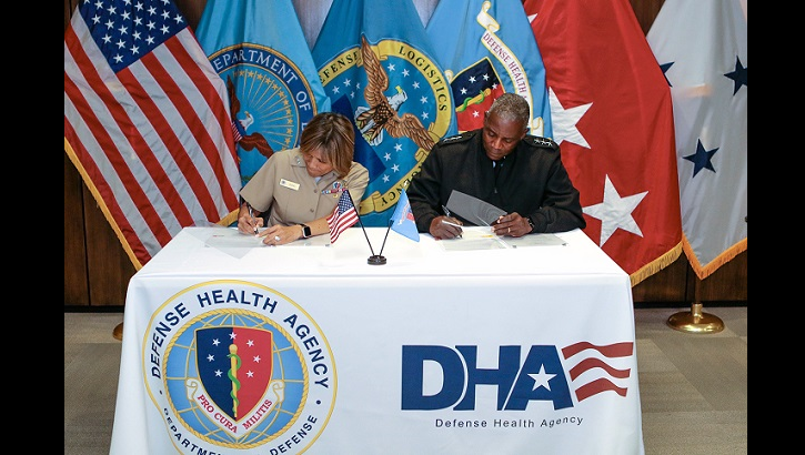 Navy Vice Adm. Raquel Bono, DHA director (left), and Army Lt. Gen. Darrell Williams, DLA director (right) signed a memorandum of agreement on Aug. 15, at Defense Health Headquarters. The agreement clarifies the agencies' complementary roles and responsibilities, avoiding duplication of effort while retaining DLA as DHA's acquisition enabler of choice for medical materiel. (MHS photo)
