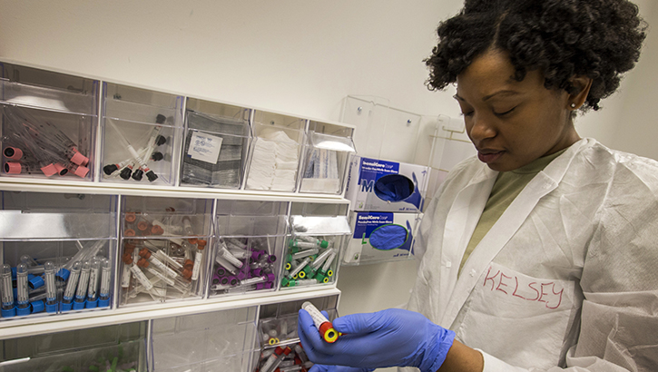 Image of Air Force Senior Airman Kristen N. Kelsey, a medical laboratory technician with the 514th Aeromedical Evacuation Squadron, Air Force Reserve Command, labels blood samples at Joint Base McGuire-Dix-Lakehurst, New Jersey. (U.S. Air Force photo by Master Sgt. Mark Olsen).