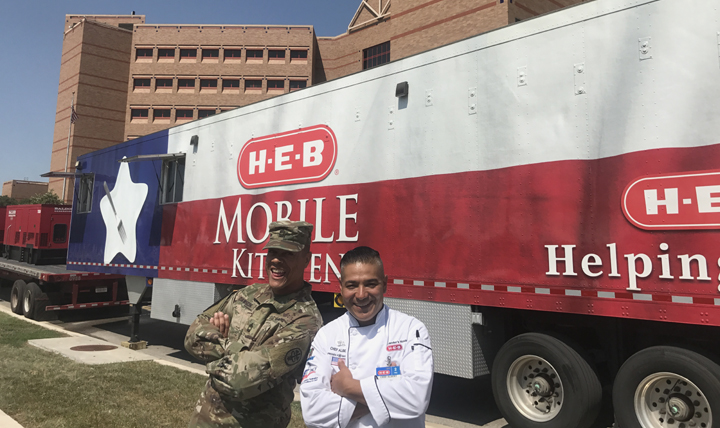 After working together in the aftermath of Hurricane Harvey, Army Master Sgt. Dean Dawson meets again with brother-in-law and chef Albert Rodriguez during the Invincible Spirit Festival at Brooke Army Medical Center, Joint Base San Antonio. (Courtesy photo)