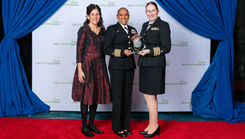  Naval Hospital Twentynine Palms Director Capt. Janiese Cleckley (center) and Chief Medical Officer Capt. Lisa Gibson (right) accept the Leapfrog Top Hospital award from Linda Schwimmer (left), chair of the board for the Leapfrog Group