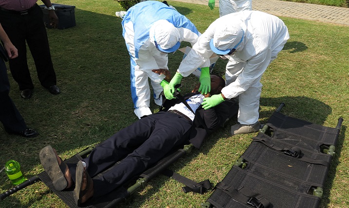 A medical team straps a role-playing patient onto a stretcher during a class at the West African Preparedness Initiative in Accra, Ghana. The training was conducted by the Defense Institute for Medical Operations. (Courtesy photo)