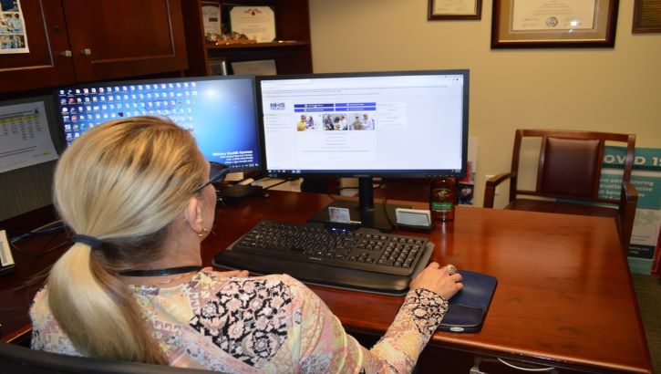 Image of Elaine Sanchez explores the new MHS GENESIS Patient Portal at Brooke Army Medical Center, Joint Base San Antonio-Fort Sam Houston, Texas, Oct. 6, 2021. The San Antonio Market will transition to the new electronic health record system – known as MHS GENESIS – in January 2022. Click to open a larger version of the image.