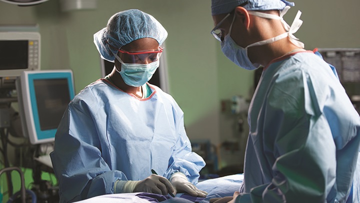 Image of Two surgeons in an operating room.