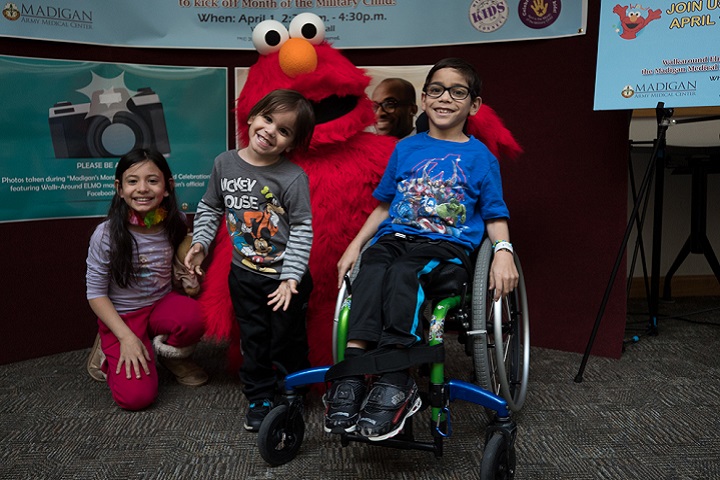 Sesame Street's Walkaround Elmo visited Madigan Army Medical Center families on April 1 to celebrate the seven-year anniversary of Military Kids Connect and the recent relaunch of its website. (U.S. Army photo by Ryan Graham)