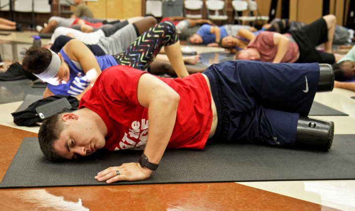 Marine Corps Sgt. Ivan Sears participates in a yoga class at Joint Base San Antonio. Topics like yoga and other therapeutic recreation programs for wounded warriors were covered during the Federal Advanced Amputation Skills Training or FAAST Symposium in Bethesda, Maryland. (U.S. Army photo by Staff Sgt. Tomora Nance)