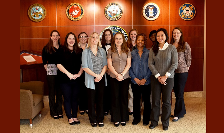 Personnel from the Armed Forces Medical Examiner System Department of Defense DNA Registry Family Reference Sample-Laboratory Automation group pose for a photo, at AFMES on Dover Air Force Base, Delaware. The FRS-LA group’s primary mission is to process family reference samples for the past accounting community as well as current day operations. (U.S. Air Force photo by Senior Airman Ashlin Federick)