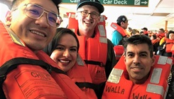 U.S. Navy Lt. Holly Sapien, Navy Nurse Corps officer assigned to Naval Hospital Bremerton (second from left), along with husband U.S. Navy Musician 1st Class Michael Sapien (far right), U.S. Navy Lt. Randy Le, Naval Hospital Bremerton registered dietitian (left) and Musician 3rd Class John Landis (back) pause for a selfie moment onboard the Bremerton to Seattle ferry Walla Walla after it ran aground on Bainbridge Island, April 15. During that time, Sapien responded to a medical emergency, taking the lead in stabilizing another passenger dealing with an epileptic seizure. (Courtesy photo).