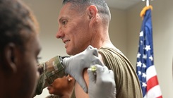 U.S. Army Col. Darryl Metcalf, commander of the U.S. Army Medical Department Agency, receives his flu vaccine at a recent vaccination clinic on October 3, 2024. The agency anticipates distributing nearly 1.4 million doses of vaccine this flu season.(Photo by Abigail Carey/Fort George G. Meade Public Affairs Office)