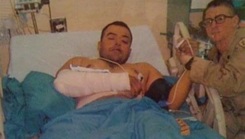 Military personnel healing in hospital bed