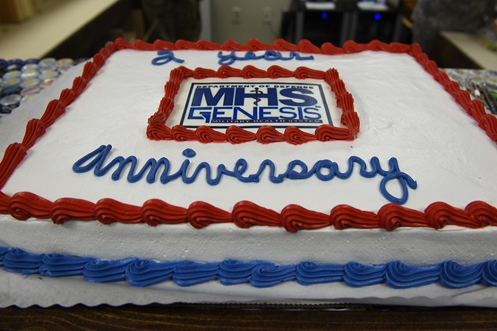 A cake celebrating the second year anniversary of Military Health System GENESIS' arrival to Fairchild's 92nd Medical Group at Fairchild Air Force Base, Washington, Feb. 8, 2019. MHS GENESIS is a Department of Defense-wide electronic health record and management system that combines health records from base, civilian and Veteranâ€™s Affairs primary care providers, pharmacies, laboratories and dental clinics into one network. (U.S. Air Force photo/Airman 1st Class Lawrence Sena)