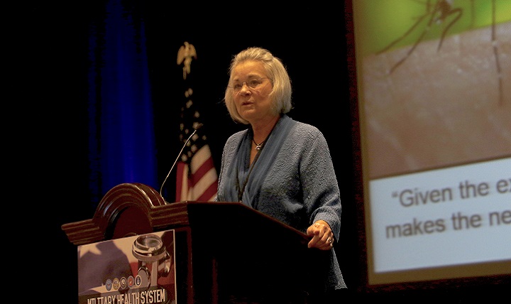 Dr. Karen Guice, acting assistant secretary of Defense for Health Affairs, presents the keynote address opening the 2016 Military Health System Research Symposium in Orlando, Florida. During her address, Guice unveiled the MHS Research ASD(HA) Challenge. She encouraged attendees to share their published MHS-funded research findings with her at @DrGuiceMHS.