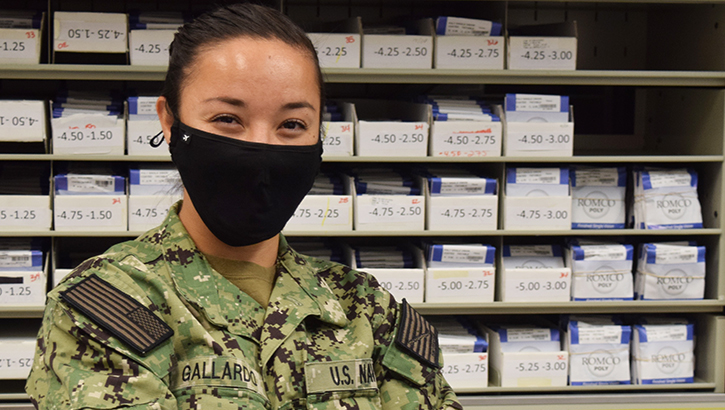Image of Female soldier wearing a black mask.
