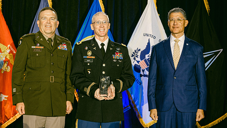  U.S. Army Col. (Dr.) Michael Wirt, Brooke Army Medical Center department of radiology chief, poses for a photo with BAMC Commander Army Col. Mark Stackle and retired Army Maj. Gen. (Dr.) Joseph Caravalho Jr., Henry M. Jackson Foundation president and CEO