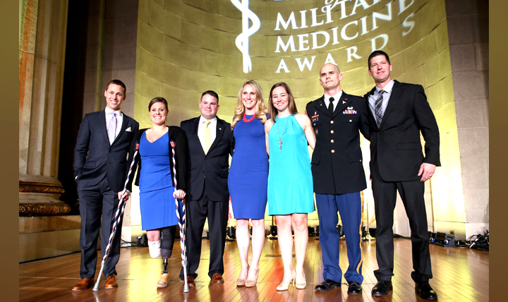At the Heroes of Military Medicine ceremony Thursday, May 5, 2016, in Washington, D.C., honorees Patrick Downes, Jessica Kensky and Capt. Ferris Butler share the stage with Annemarie Orr, Kelly McGaughey, Lt. Col. Kyle Potter and Art Molnar.