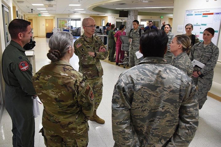 Air Force Col. Michelle Aastrom, 81st Inpatient Operation Squadron commander, discusses the intensive care unit capabilities with Army Maj. Gen. Ronald Place, Defense Health Agency, director for the National Capital Region Medical Directorate and Transition Intermediate Management Organization, during an immersion tour inside the Keesler Medical Center at Keesler Air Force Base, Mississippi, Feb. 13, 2019. The purpose of Place's two-day visit was to become more familiar with the medical center's mission capabilities and to receive the status of the 81st Medical Group's transition under DHA. (U.S. Air Force photo by Kemberly Groue)