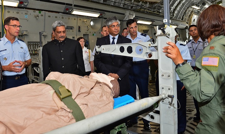 Pacific Air Forces Airmen demonstrate the aeromedical evacuation capabilities of the C-17 Globemaster III to Indian Defense Minister Manohar Parrikar, left, and Arun K. Singh, the Indian ambassador to the U.S., on Joint Base Pearl Harbor-Hickam, Hawaii, Dec. 7, 2015.