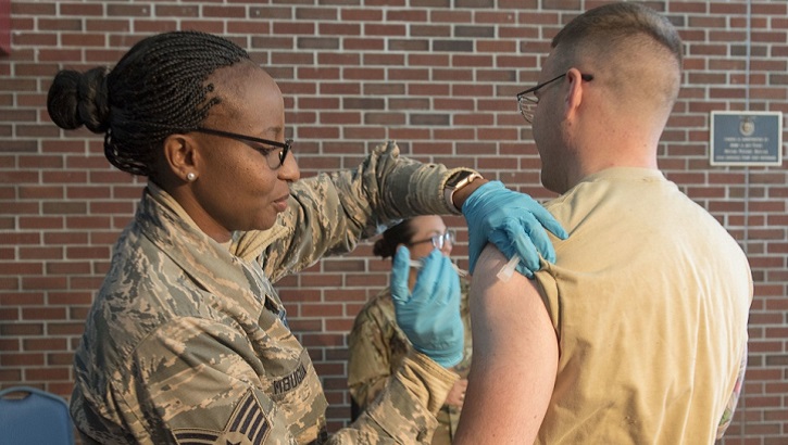 Air Force Staff Sgt. Jaqueline Mbugua and members of the Massachusetts Air National Guard’s 102nd Medical Group traveled to the Roxy Theater on Joint Base Cape Cod to provide flu shots to Airmen Nov. 2, 2019. (U.S. Air Force photo by Tech. Sgt. Thomas Swanson).