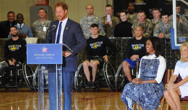 Britain’s Prince Harry talks to wounded warriors at Fort Belvoir, Virginia, alongside first lady Michelle Obama and Dr. Jill Biden, as they officially launch the second Invictus Games, Oct. 28, 2015. The games are set to be held in Orlando, Florida, in May. (DoD photo by Katie Lange)