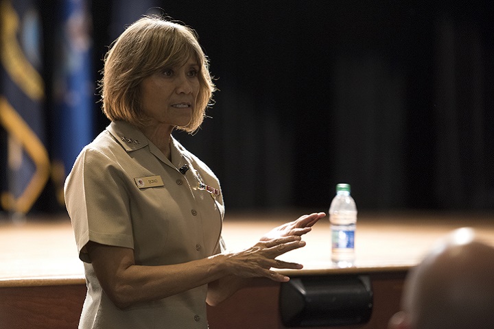 Navy Vice Adm. Raquel Bono, Defense Health Agency director, answers questions during a medical group meeting at Joint Base Charleston. The visit consisted of a consolidated mission brief, a strategic discussion with military medical senior leadership, a 628th Medical Group facility walking tour and ended with an in-depth question and answer session regarding the transition of Air Force military treatment facilities to DHA. (U.S. Air Force photo by Airman 1st Class Helena Owens)