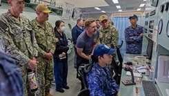 Personnel from Commander, Submarine Group Seven; U.S. Naval Hospital Yokosuka; Japan Self-Defense Force Hospital Yokosuka; Japan Maritime Self-Defense Force Undersea Medical Center; and the Navy Dive Locker at U.S. Naval Ship Repair Facility and Japan Regional Maintenance Center observe hyperbaric chamber operations during a bilateral emergency medical drill.