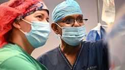 U.S. Air Force reservist Capt. Whitney Dorame (left), 349th Medical Squadron nurse anesthetist, and a partner nation anesthesiologist, work together to exchange best practices during surgery at Owen King European Union Hospital, Castries, St. Lucia, Feb. 26, 2024. (Photo by U.S. Air Force Staff Sgt. Madeline Herzog)