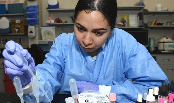 Air Force Staff Sgt. Mari Crespo, a medical laboratory technician, conducts tests on a blood bank unit at Joint Base Langley-Eustis, Virginia, June 26, 2017. A program that allows lab developed tests for purchased care for TRICARE beneficiaries has been renewed. (U.S. Air Force photo/Staff Sgt. Teresa J. Cleveland) 