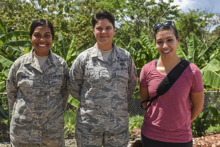 From left to right: U.S. Air Force Senior Airman Ariel Thomas, 346th Air Expeditionary Group medical technician, Master Sgt. Reina Blake, 346 AEG Office of the Legal Advisor superintendent, and Special Agent Alexandra Garced, Air Force Office of Special Investigations agent, stand for a group photo in Meteti, Panama. Blake, Thomas and Garced are credited with saving the life of a local Panamanian woman after she jumped from a bridge. (U.S. Air Force photo by Senior Airman Dustin Mullen)