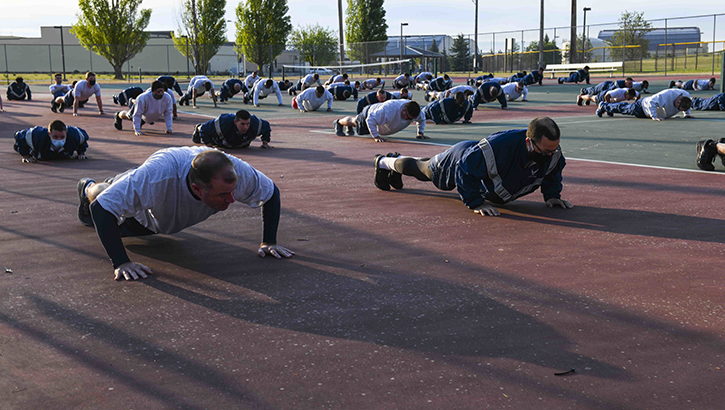 Military personnel doing pushups