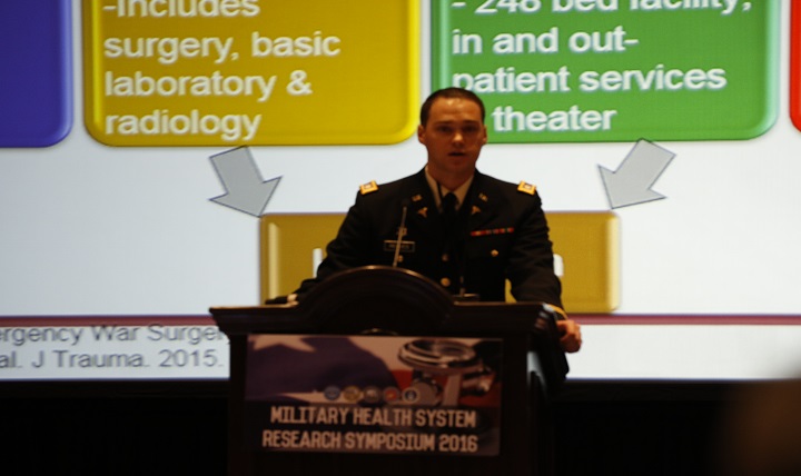 Air Force Capt. David Lindholm, of the San Antonio Military Medical Center, highlights the dangers of mosquito-borne illnesses at the Military Health System Research Symposium in Orlando, Florida
