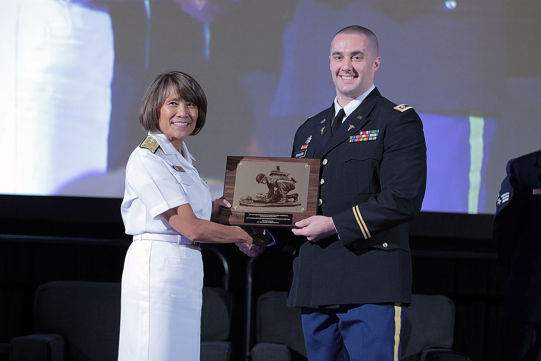 Vice Admiral Raquel C. Bono, director of the Defense Health Agency, presented U.S. Army Major Steven Schauer with the 2017 Individual Research Accomplishment for active duty service members, in the category of Military Operational Medicine, today at the Military Health System (MHS) Research Symposium. The Individual Research Accomplishment award recognizes outstanding contributions by an individual scientist that had a high impact on MHS research within the past year.  Schauer is an emergency medicine physician assigned to the U.S. Army Institute of Surgical Research. Over the past year, and while deployed, he made several significant contributions to military operational medicine through multiple research projects and policy recommendations.