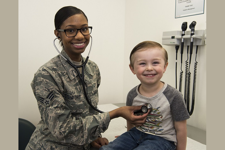 Air Force Senior Airman Shania Stanford, 366th Medical Support Squadron pediatric clinic aerospace medical technician, checks Jude's vitals during an appointment at Mountain Home Air Force Base, Idaho. The pediatric clinic takes care of Airmen and their families by ensuring the overall health of their children. (U.S. Air Force photo by Airman 1st Class Andrew Kobialka)