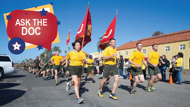 Marine Corps recruits run in formation
