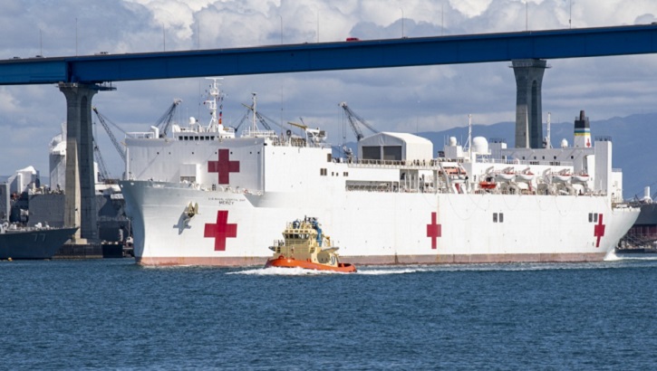 The hospital ship USNS Mercy navigates the San Diego channel March 23. Mercy deployed in support of the nation’s COVID-19 response efforts, and will serve as a referral hospital for non-COVID-19 patients currently admitted to shore-based hospitals. This allows shore base hospitals to focus their efforts on COVID-19 cases. One of the Department of Defense’s missions is Defense Support of Civil Authorities. DoD is supporting the Federal Emergency Management Agency, the lead federal agency, as well as state, local and public health authorities in helping protect the health and safety of the American people. (U.S. Navy photo by Mass Communication Specialist 3rd Class Lasheba James)