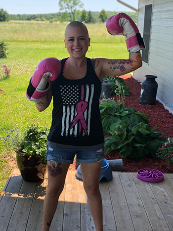 Air Force spouse posing for a photo during her battle with cancer