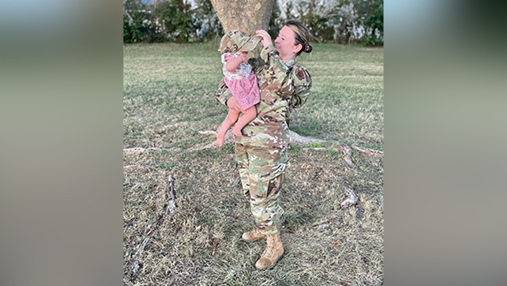 U.S. Air Force Staff Sgt. Kalee Sexton with her daughter